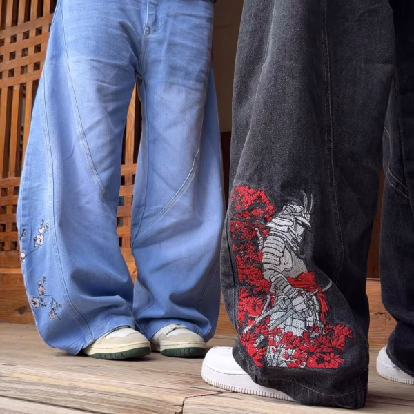 These aren't just jeans—they're a work of art.  - Our Super Baggy Samurai Jeans feature 200K+ precision embroidery stitches, showcasing a striking Samurai design with Cherry & Sakura Blossoms.