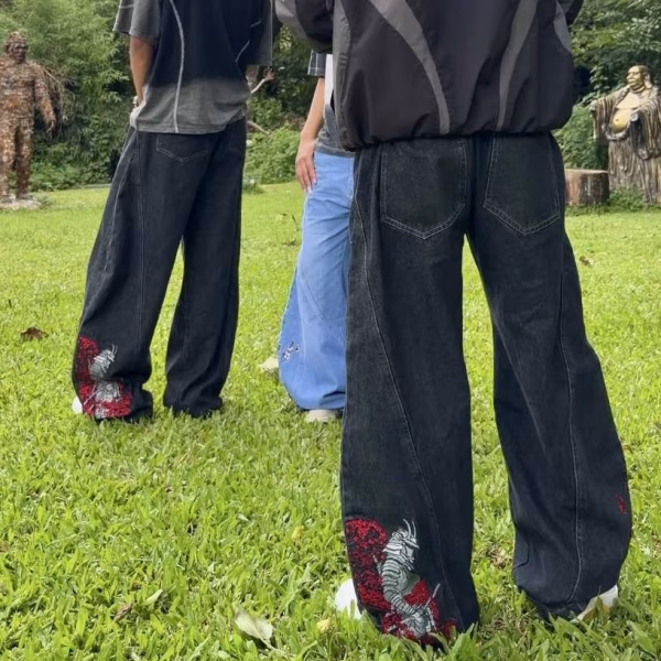 These aren't just jeans—they're a work of art.  - Our Super Baggy Samurai Jeans feature 200K+ precision embroidery stitches, showcasing a striking Samurai design with Cherry & Sakura Blossoms.