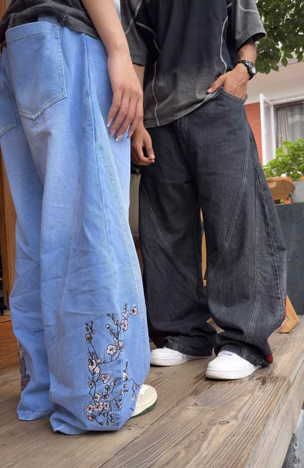 These aren't just jeans—they're a work of art.  - Our Super Baggy Samurai Jeans feature 200K+ precision embroidery stitches, showcasing a striking Samurai design with Cherry & Sakura Blossoms.